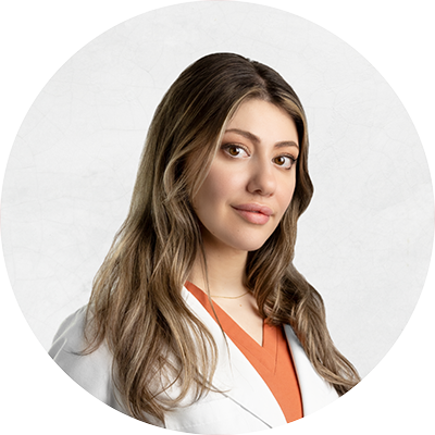Sarah Gottfeld profile image in white collard top